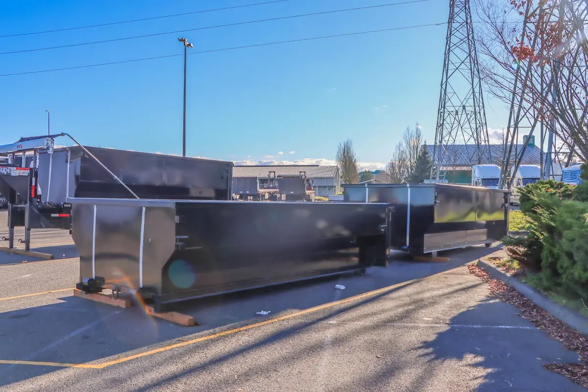 Roll-off dumpster ready for waste disposal at job site for Demolition Dumpster Rental in East Brunswick